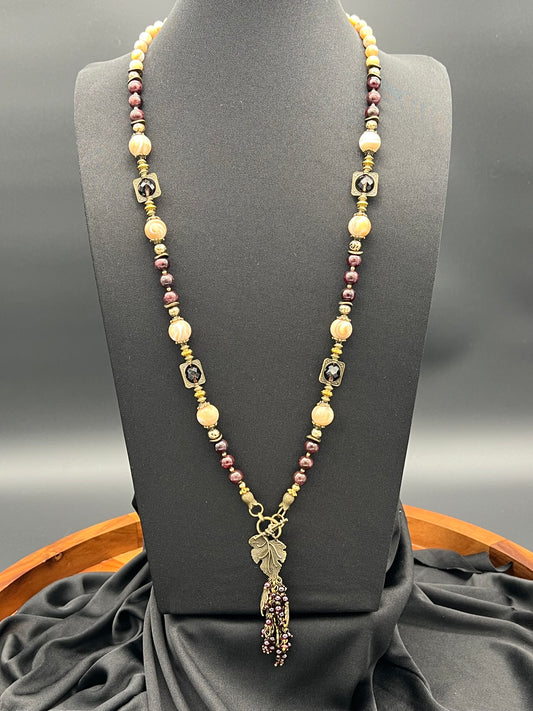 Neckless With Garnet and Brown Shell beads